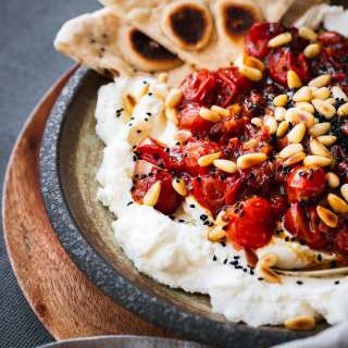 Labneh Dip With Harissa-Spiced Cherry Tomato Sauce