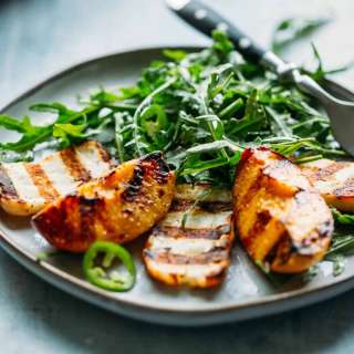 Grilled Halloumi + Peaches with Arugula, Jalapeños and a Honey Lemon Vinaigrette