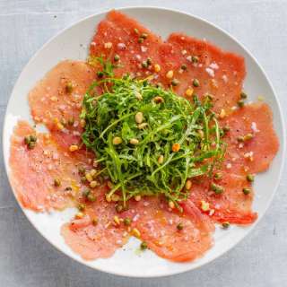 Classic Tuna Carpaccio with Arugula, Capers and Pine Nuts