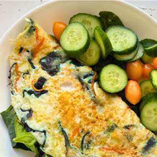 Cheesy Egg White and Veggie Omelet on Fresh Salad