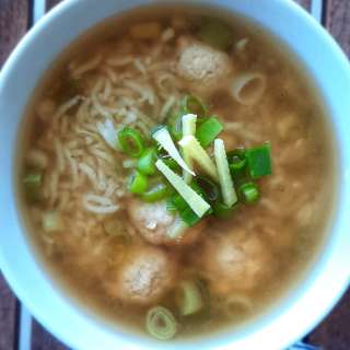 Porridge Di Riso Con Polpette Di Maiale