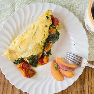 Roasted Tomato Omelet with Spinach, Pesto & Cheese
