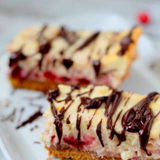 Holiday Cranberry Cheesecake Bars with Chocolate Drizzle