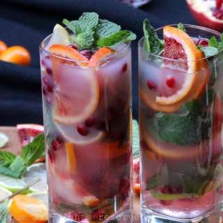 Citrus pomegranate mojito with arak