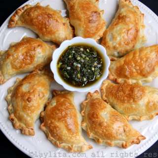 Asparagus empanadas with fava bean, peas and goat cheese