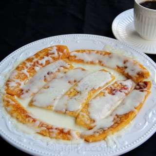 Skilled of fried plantains with melted cheese