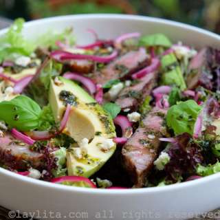 Steak salad with blue cheese, avocado and basil balsamic dressing