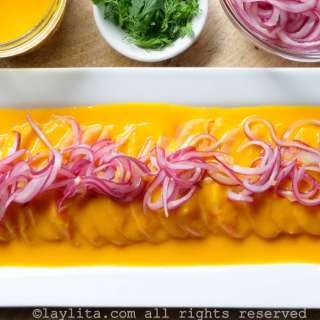 Salmon tiradito with passion fruit aji sauce