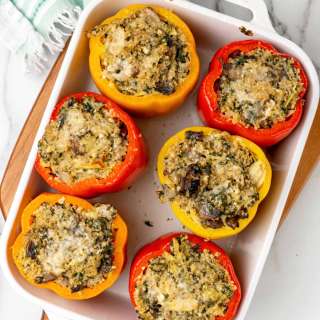 Cheesy Spinach and Artichoke Quinoa Stuffed Peppers