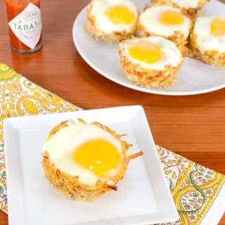 Hash Brown Nests with Egg, Ham, and Sharp Cheddar