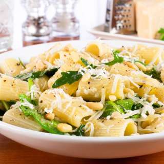 Lemony Rigatoni with Spinach, Arugula, and Pine Nuts