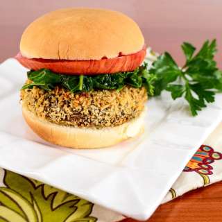 Panko-Crusted Portobello Mushroom with Boursin, Braised Kale, and Heirloom Tomato