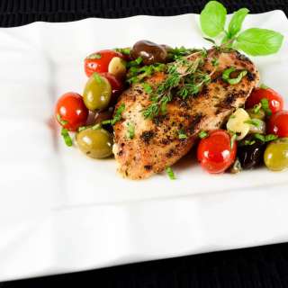Baked Mediterranean Chicken Breasts with Tomatoes, Olives, Capers, and Garlic