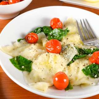 Basil-Ricotta Ravioli with Spinach and Blistered Tomatoes