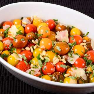 Roasted Baby Heirloom Tomatoes with Basil, Shaved Parmesan, and Toasted Pine Nuts