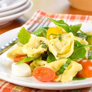 Cheese Tortellini Pasta Salad with Tomatoes, Arugula, and Mozzarella