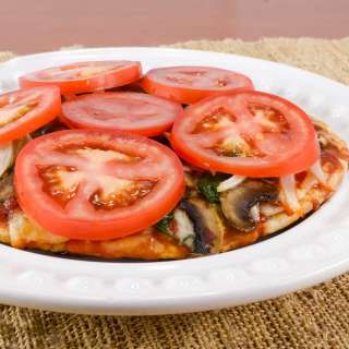 Pita Pizza with Spinach, Mushrooms, Onions, and Fresh Tomatoes