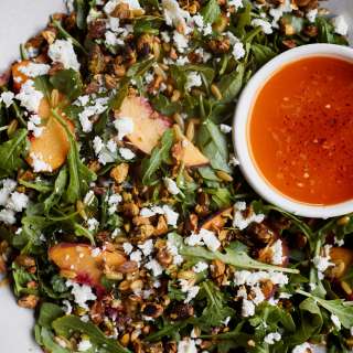 Peach Salad with Maple Pistachios and Chile Butter Dressing