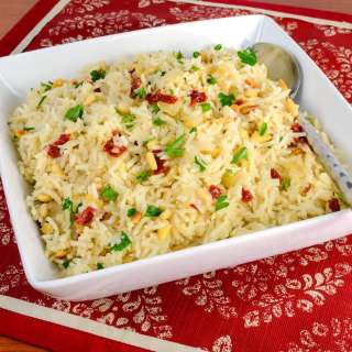Garlic Rice with Sautéed Onions, Sun-Dried Tomatoes, and Toasted Pine Nuts