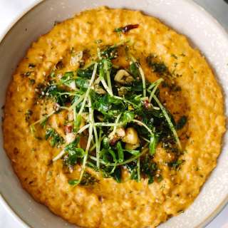 Sunflower Carrot Risotto with Hazelnut-Pea Shoots