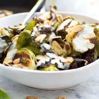 Crispy brussels sprouts with tahini sauce and almonds