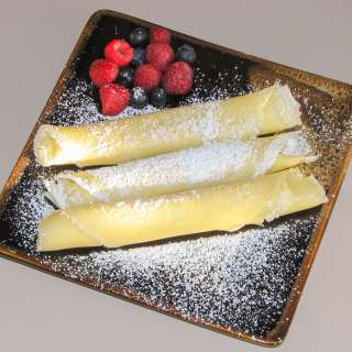 Crepes with Melted Butter and Powdered Sugar