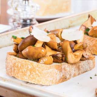 Buttery Chanterelle Mushrooms on Sourdough Toast with Shaved Parmesan