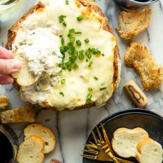 Baked Crab Artichoke Dip in a Bread Bowl