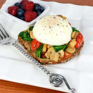 Poached Egg on Toast with Sautéed Mushrooms, Tomatoes, and Spinach