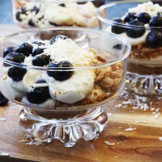 A lighter blueberry & white chocolate cheesecake in a glass