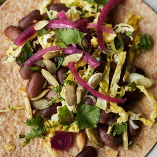 Bean and Cabbage Tacos with Pickled Onions