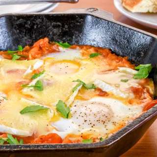 Eggs in Garlicky Tomato Sauce with Brie