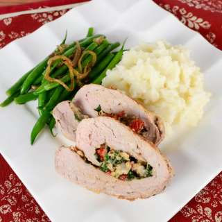 Pork Tenderloin Stuffed with Spinach, Roasted Bell Pepper, Mushroom, and Parmesan