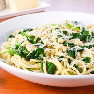 Spaghetti with Garlicky Spinach, Parmesan, and Toasted Pine Nuts