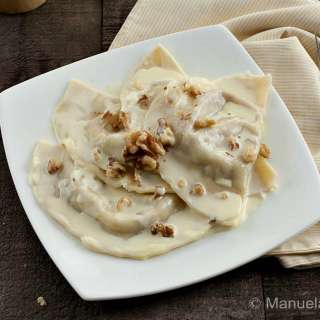 Taleggio and Walnut Mezzelune with Parmigiano Reggiano Fondue