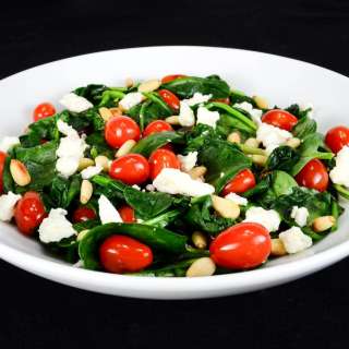 Spinach Sauté with Grape Tomatoes, Feta Cheese, and Toasted Pine Nuts