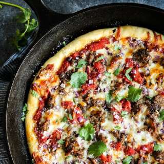 Skillet Pizza with Sausage and Chili Garlic Tomato Sauce