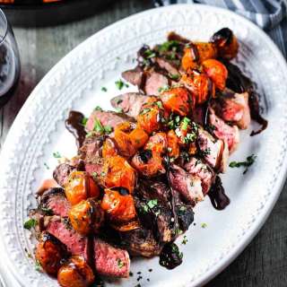 Seared Ribeye with Blistered Tomatoes and Bordelaise Sauce