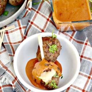 Cheese Stuffed Meatballs with a Creamy Tomato Sauce