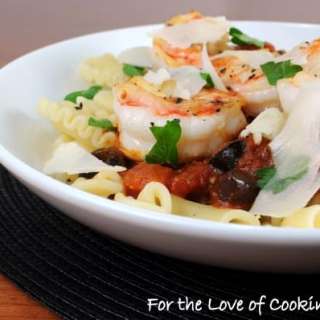 Shrimp and Olive Marinara over Galletti Topped with Parmesan