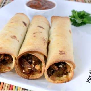 Shredded Beef, Caramelized Onion, and Cotija Cheese Baked Flautas