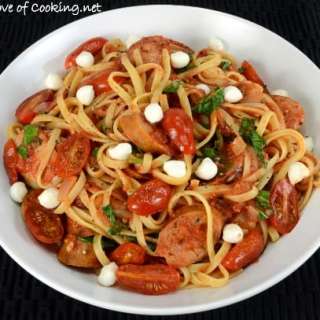Linguine In Tomato Sauce with Chicken Sausage, Blistered Tomatoes, Kale, and Mozzarella Pearls