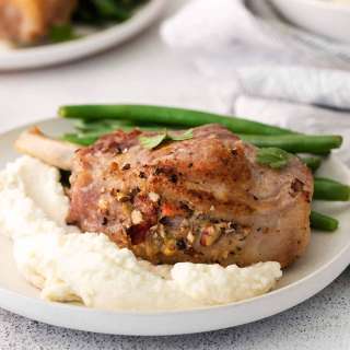 Pork Chops with Andouille & Pecan Stuffing