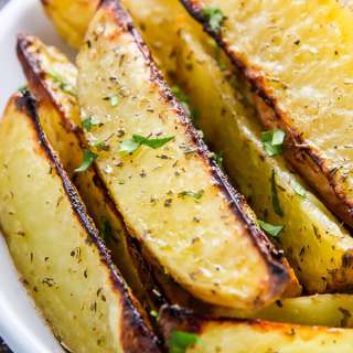 Extra Crispy Baked Garlic & Herb Potato Wedges