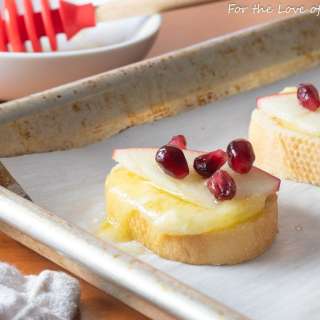 Brie Apple Crostini with Honey and Pomegranate Seeds