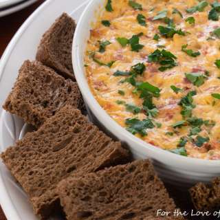 Reuben Dip with Dark Rye Crostini