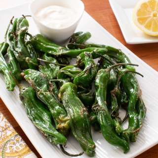 Blistered Shishito Peppers with Lemon and Garlic Butter