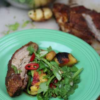 Crisp Pork belly with grilled peach salad on the BBQ