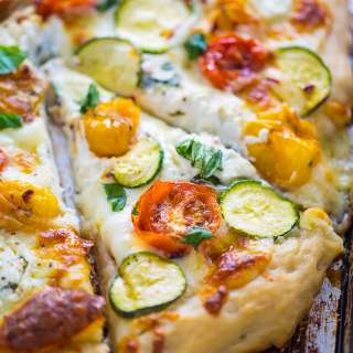 White Pizza with Tomatoes, Basil, and Zucchini