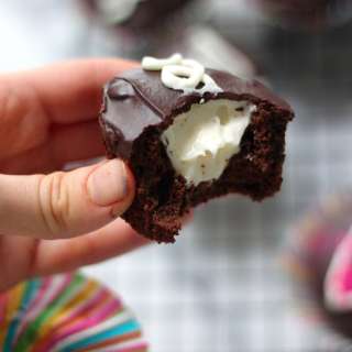 Dreamy Chocolate Cupcakes Filled with White Buttercream and Topped with Chocolate Ganache